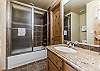 Full hall bathroom in the lower level.  This is shared with the second and third bedrooms.