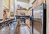 Beautiful kitchen with high ceilings and lots of natural light.