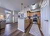 Open kitchen with stainless steel appliances & granite countertops