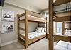 Twin XL bunk beds comfortably accommodate adults and kids.