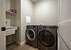 The laundry room is equipped with a full-sized
washer and dryer for your convenience.