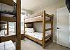 Twin XL bunk beds comfortably accommodate adults and kids.