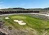 View of the property from across the golf course. 