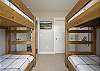 Twin XL bunk beds comfortably accommodate adults and kids.