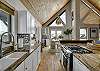 Kitchen located on the main level of the home as part of the open concept floor plan. 