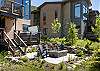 Gas firepit, seating area, and private hot tub. 