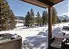 Hot tub located on the back patio with access via the living area. 