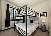 2nd bedroom located on the upper floor with full over queen bunk bed