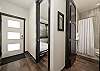Entry area and access to bedroom w/bunk beds and hallway bathroom