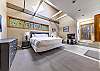 Offers a king bed, vaulted ceiling, and en-suit

This property uses the Triple Sheet Method where we use two sheets to encase the comforter.  This sheet-made duvet cover gets washed between each and every guest to provide an extra clean sleeping experience. 