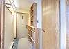 Entry way to the property offers plenty of storage for coats, boots, shoes, hats, etc.