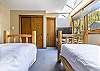 Offers 2 twin size beds.

This property uses the Triple Sheet Method where we use two sheets to encase the comforter.  This sheet-made duvet cover gets washed between each and every guest to provide an extra clean sleeping experience. 