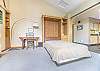 Full length partition closes off the living area for added privacy.

This property uses the Triple Sheet Method where we use two sheets to encase the comforter.  This sheet-made duvet cover gets washed between each and every guest to provide an extra clean sleeping experience. 