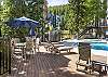 Amenity deck with lounge chairs and seating 