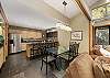 Seating for 4 guests at the kitchen island.
