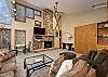 The gas fireplace, flat screen TV, and large sectional provide a great space to relax, unwind, and have family time.