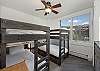 Third Bedroom offers 2 sets of twin-over-twin bunk beds.