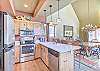 Kitchen-
Double sinks, and full size appliances.