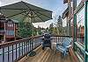 Private Balcony-
Offers seating and a grill.