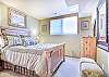 Third Bedroom-
Queen size bed, located on the lower entry level.