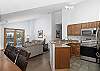 Kitchen, living- and dining area convenient located next to each other, making conversatoins and family time easy during meals