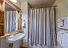 Hall Bathroom-
Located at the entry of the unit.