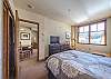 Second Bedroom-
Sleeps up to 4. Offers dresser, flat screen TV, and en-suite bathroom.