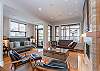 Living Area with Gas Fireplace.  Leads onto the deck with built in BBQ and outdoor furniture