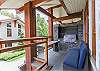 Fabulous deck off main living area with built in Gas BBQ & peak a boo views