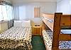 The third bedroom has a double bed and twin bunk bed. 