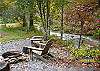 Outdoor fire pit located next to the creek 