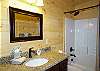 Full bathroom with shower/tub combo 