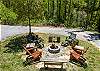 Firepit in front yard with plenty of seating available. 