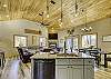 Kitchen island looking into dining and living area