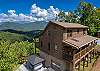 Exterior view of home and covered hot tub. 