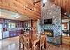 Open kitchen and dining area with gas fireplace