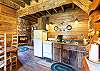 Rustic kitchen with dining room table. 