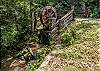 Water wheel at entrance of property. 