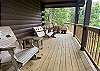 Closer view of front deck and sitting areas.