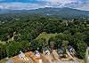 Aerial view of home and neighboring properties. 