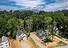 Aerial view of home and neighboring properties. 