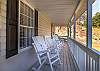 Covered porch with rocking chairs