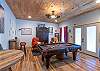 Game room with a full-size pool table.