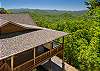 Aerial view of the hot tub on the deck with the Mountain ridgeline in the background.