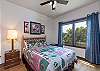 Third bedroom located downstairs with a Queen bed. 