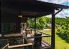Outdoor dining area and gas grill