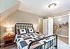Upstairs bedroom with a Queen bed. 