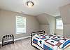 Upstairs bedroom with a Queen bed. 