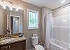 Upstairs bathroom with a tub/shower combination. 