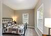 Main level bedroom with a Queen bed